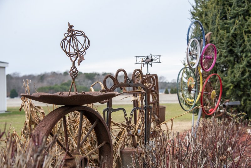 Cindy and John Chirtea’s Eagle Crest home shows the results of a lifetime of collecting and creativity as seen in the sculpture path built by John with found objects.
